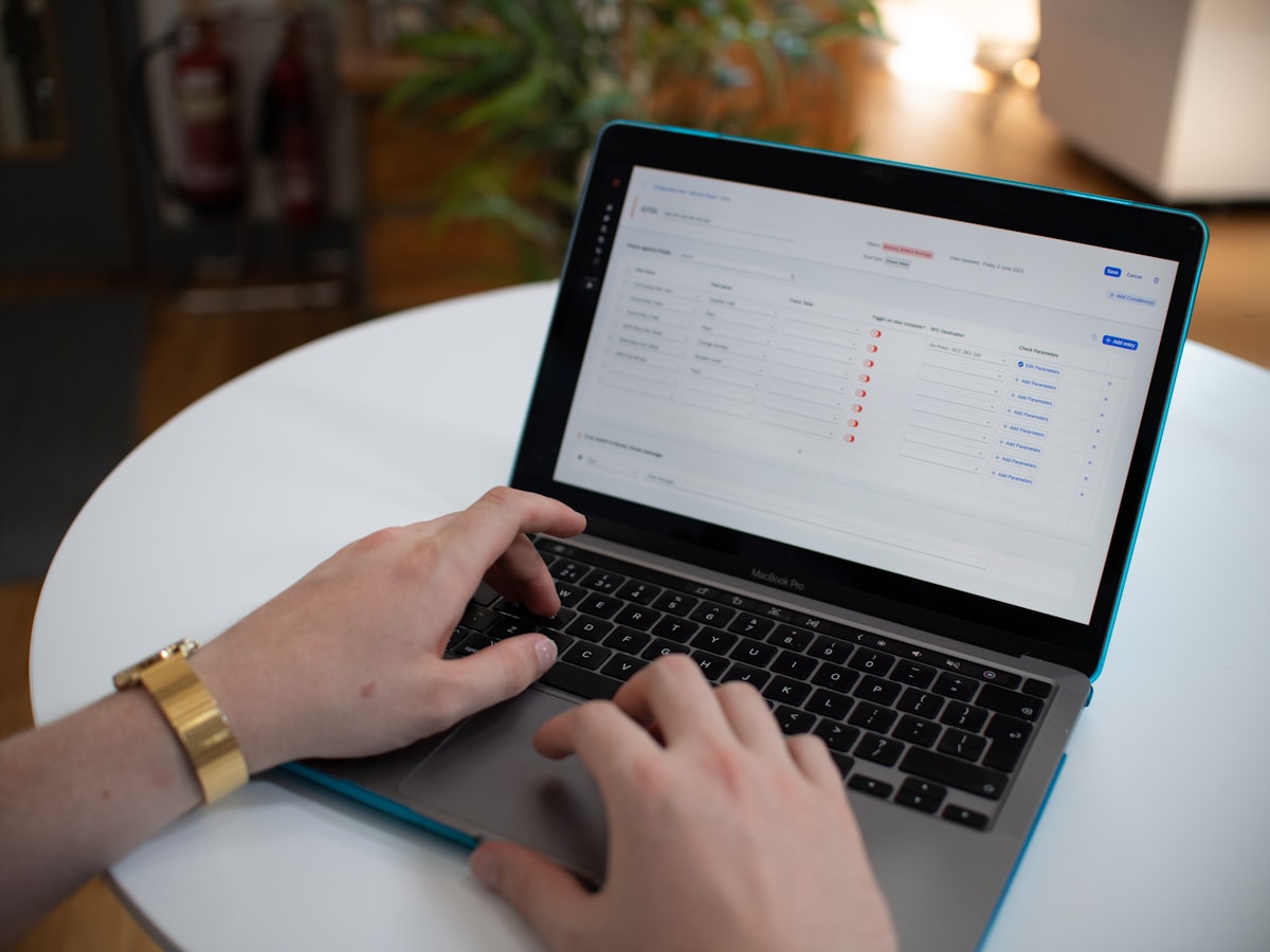 Spreadsheet data on a laptop screen for publisher prospecting